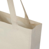 a white bag with a handle