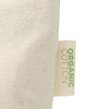 a white fabric with green text