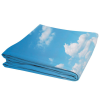 a blue folded blanket with clouds in the sky