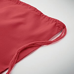 Additional Image 1 - a red bag on a white surface