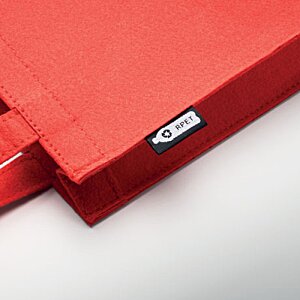 Additional Image 4 - a red bag with a white label