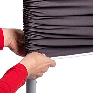 Additional Image 1 - a person holding a piece of fabric