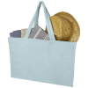 a bag with a hat and a straw hat inside