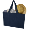 a blue bag with a straw hat and a white background