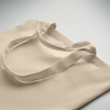 a white bag on a white surface