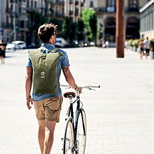 Additional Image 9 - a man walking with a bicycle