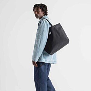 Additional Image 2 - a man carrying a bag