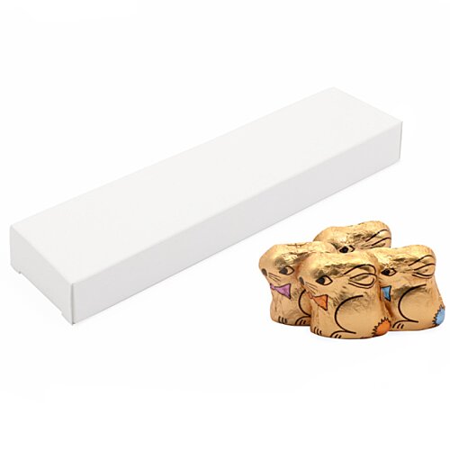 Additional Image 1 - a white rectangular object next to a pile of gold objects