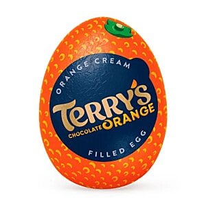 Additional Image 1 - an orange egg with a blue label