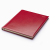 a red notebook on a white background