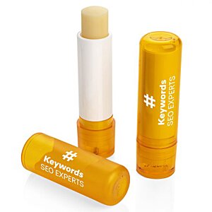 Additional Image 14 - a group of orange lip balms