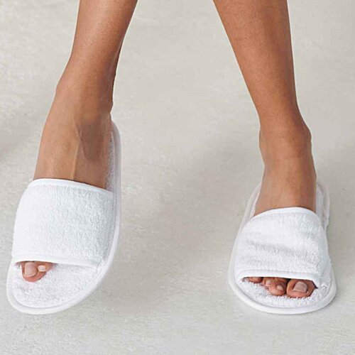 Additional Image 4 - a pair of feet wearing white socks