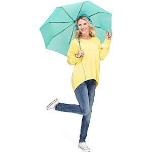 Additional Image 5 - a woman holding an umbrella