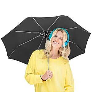 Additional Image 4 - a woman wearing headphones and holding an umbrella