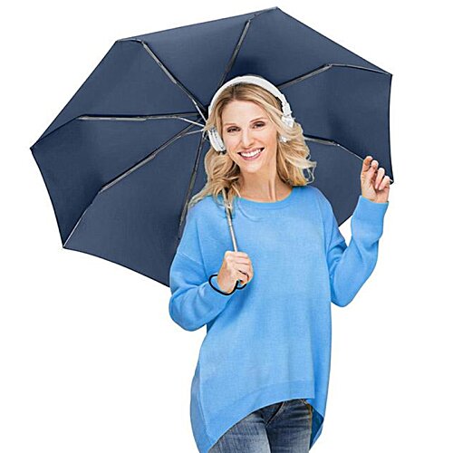 Additional Image 3 - a woman holding an umbrella