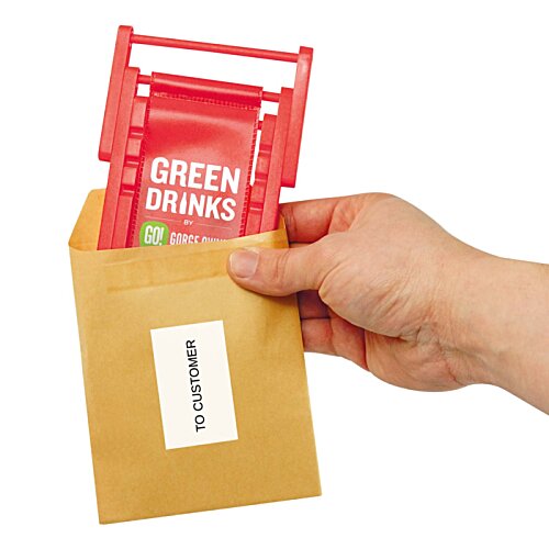 Additional Image 3 - a hand holding a brown envelope with a red packet