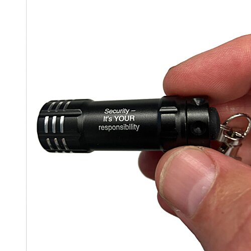 Additional Image 2 - a hand holding a black flashlight