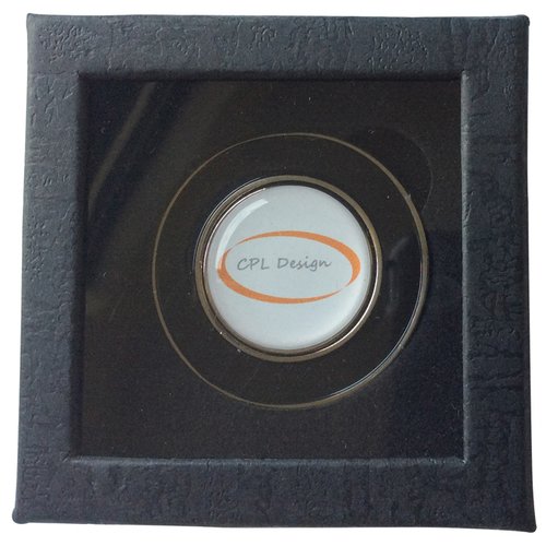 Additional Image 1 - a black square with a silver circle in it