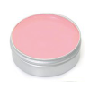 a round container with a pink lid