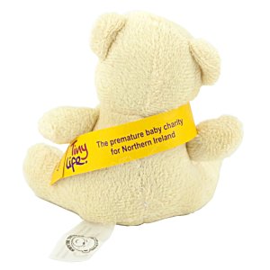 Additional Image 3 - a stuffed bear with a yellow ribbon