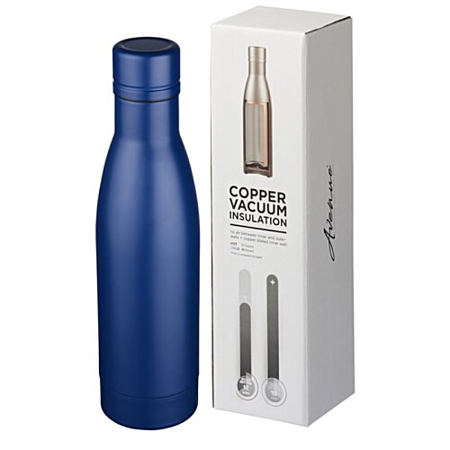Additional Image 2 - a blue bottle next to a box