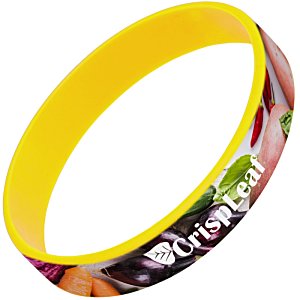 Additional Image 1 - a yellow rubber bracelet with a colorful design