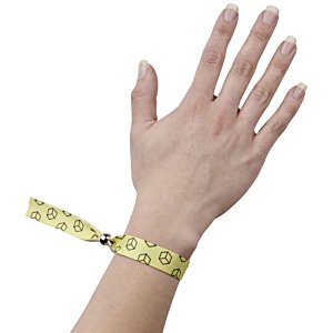 Additional Image 1 - a hand with a yellow tape measure around the wrist