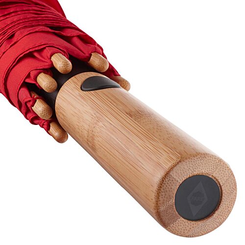 Additional Image 3 - a hand holding a wooden bat