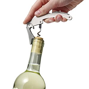 Additional Image 5 - a hand holding a bottle of wine