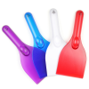 a group of colorful plastic spatulas