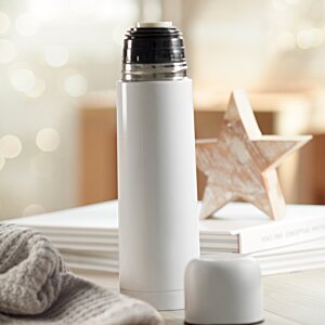 Additional Image 2 - a white bottle with a black lid