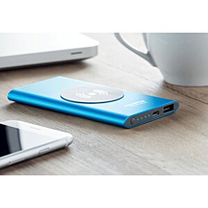 Additional Image 1 - a blue rectangular device on a table