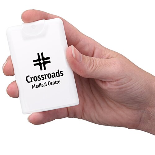 Additional Image 1 - a hand holding a white rectangular object