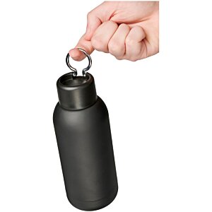 Additional Image 1 - a hand holding a black bottle