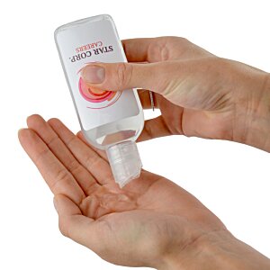 Additional Image 2 - a person using a hand sanitizer