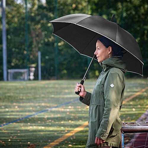 Additional Image 7 - a person holding an umbrella