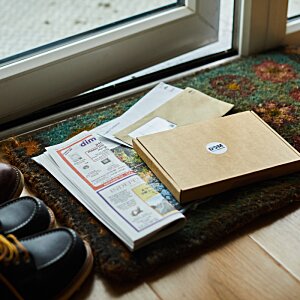 Additional Image 11 - a pile of papers and a pair of shoes