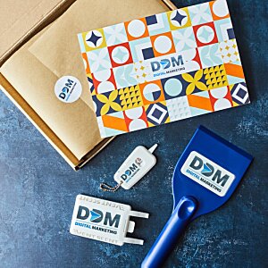 Additional Image 1 - a blue object next to a brown envelope