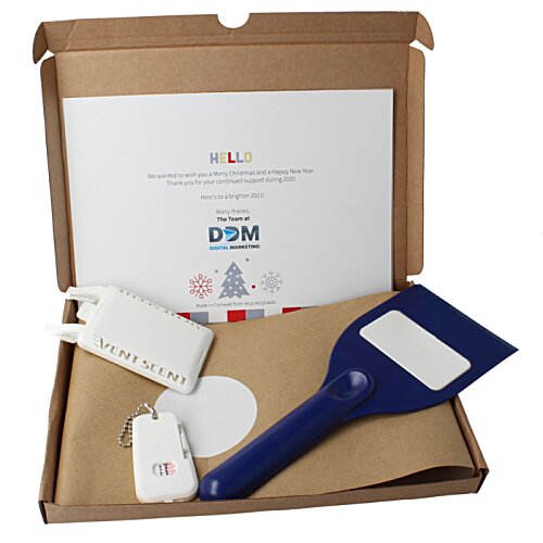 Additional Image 8 - a box with a pizza cutter and a pizza slicer