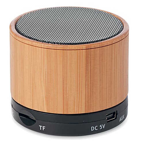 Additional Image 2 - a round wooden object with a black circle