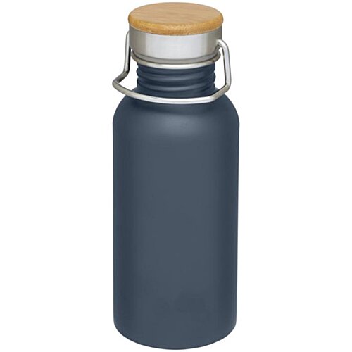 Additional Image 3 - a blue bottle with a brown cap