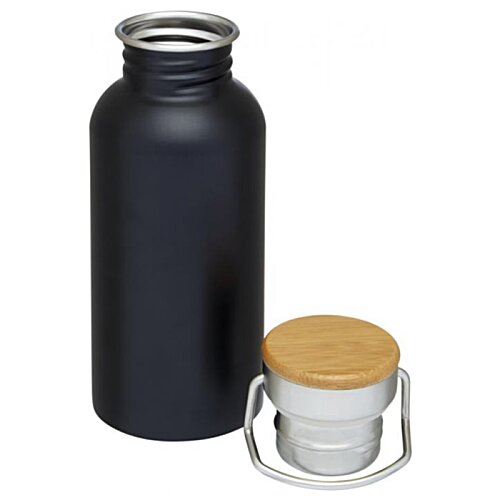 Additional Image 1 - a black bottle and a white cup