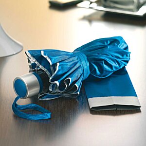 Additional Image 2 - a blue umbrella on a table