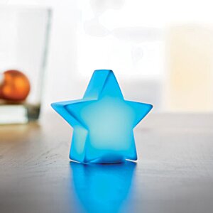 Additional Image 4 - a blue star shaped object on a table