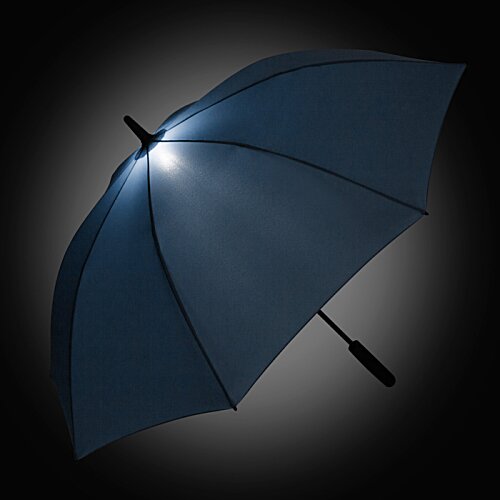 Additional Image 5 - a blue umbrella with a light shining on it