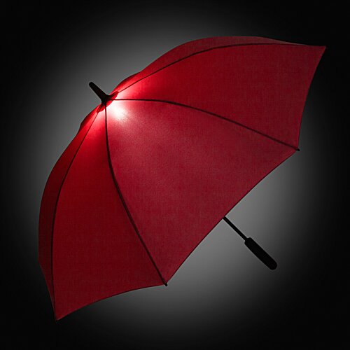Additional Image 1 - a red umbrella with a light shining on it