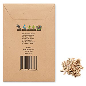 Additional Image 1 - a brown envelope with a barcode and a small pile of wood chips