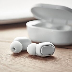 Additional Image 3 - a white earbuds on a table