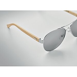 Additional Image 4 - a pair of sunglasses on a white surface