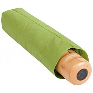 Additional Image 2 - a green tube with a round object